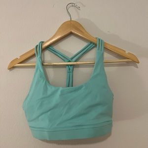 P’Tula sports bra size medium with a strappy back